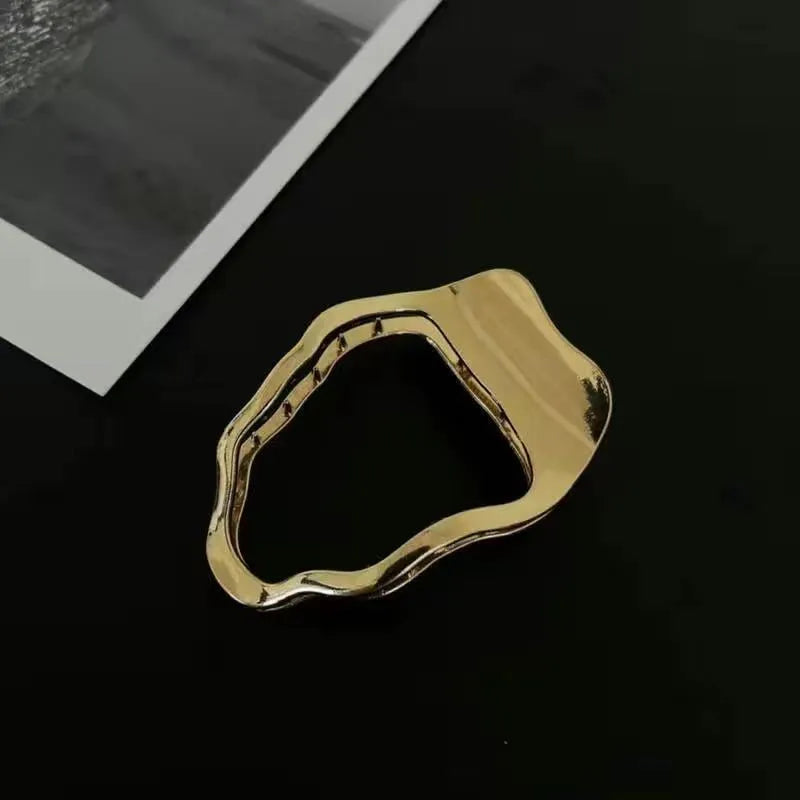 Women's zinc alloy hair barrettes in gold and silver with square, arc and triangle shapes
