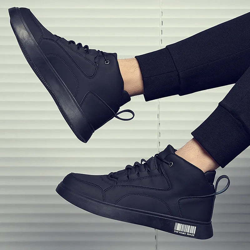 Men's white and black mid-top lace-up casual shoes with a round toe and rubber sole.