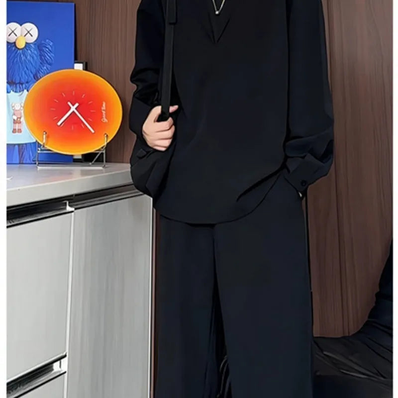 Men's black slim fit polo shirt and trousers two-piece casual suit on a hanger.