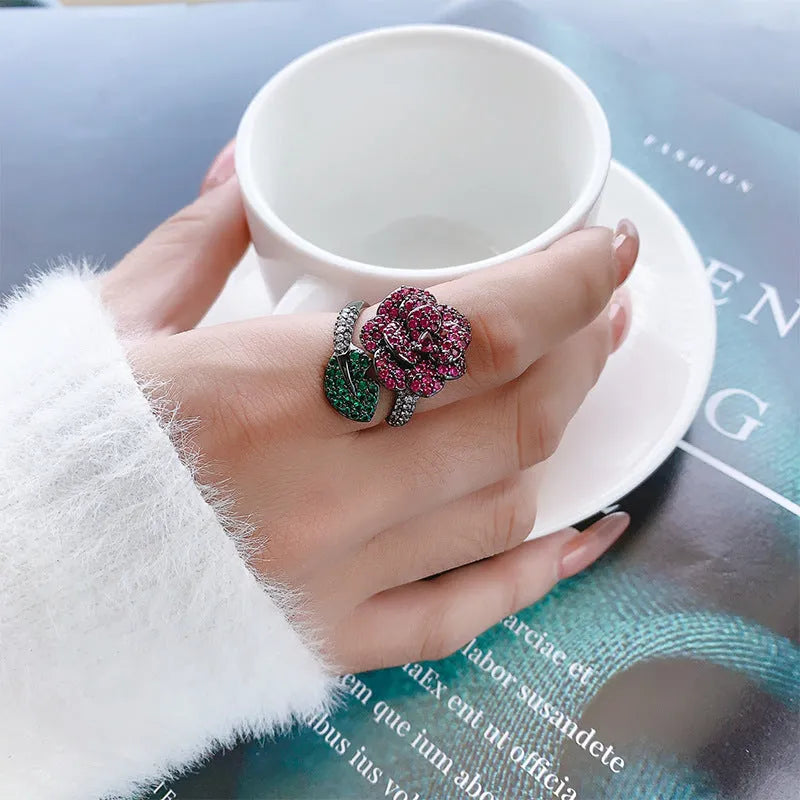 Geometric black gold floral ring with simulated red corundum stones for women