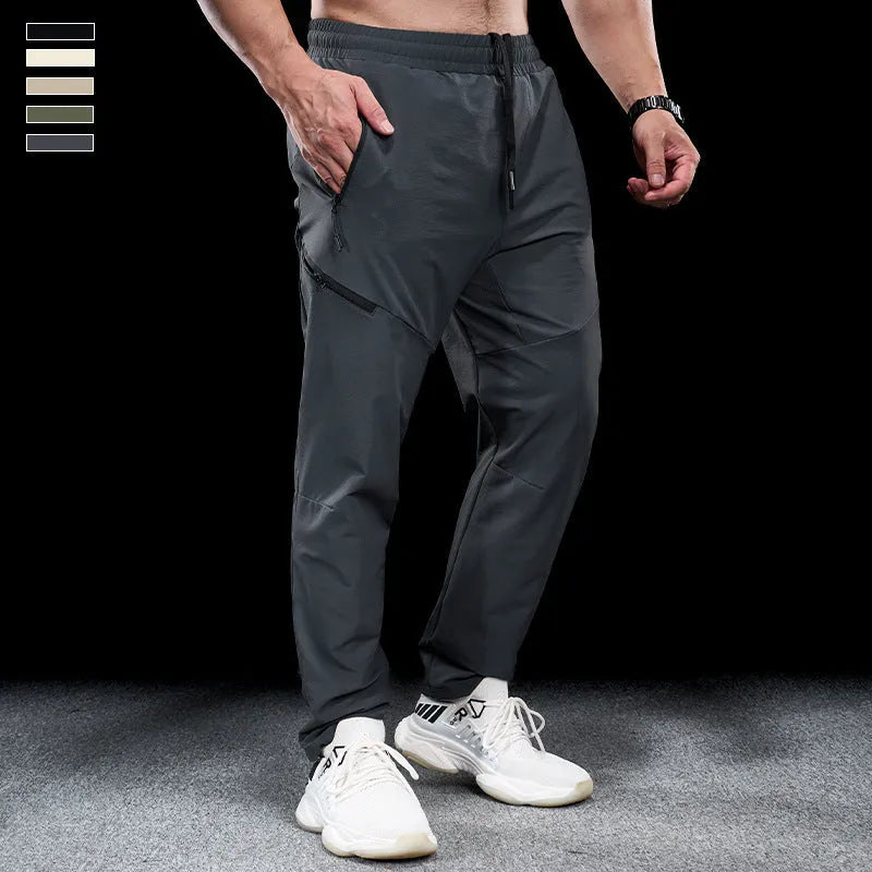 Men's waterproof quick-drying workout trousers in nylon fabric available in multiple colours and sizes