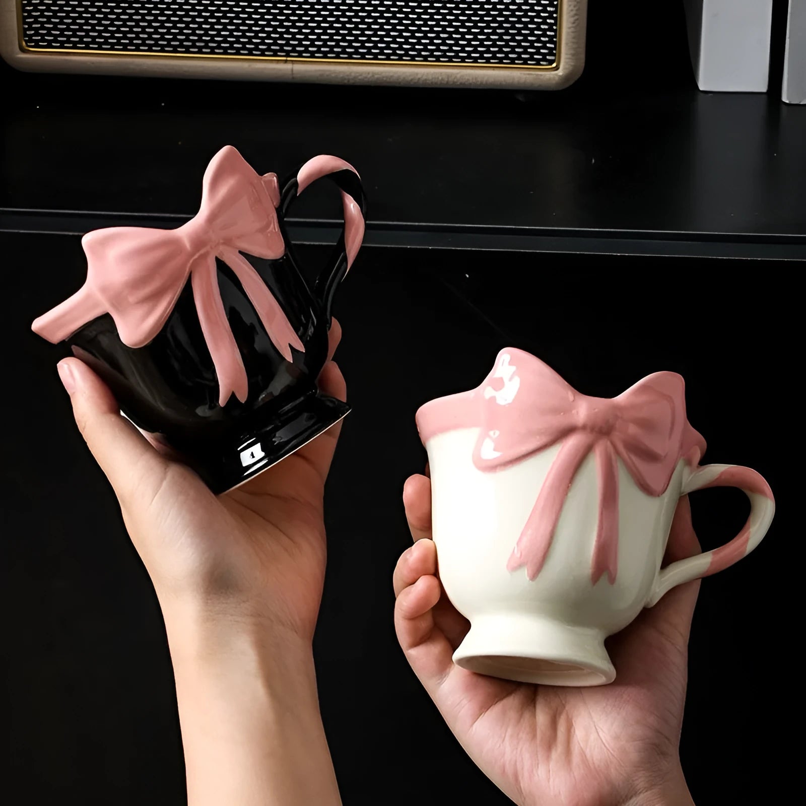 Ceramic mug with heart bow design in Black Pink colour, 301-400ml capacity.