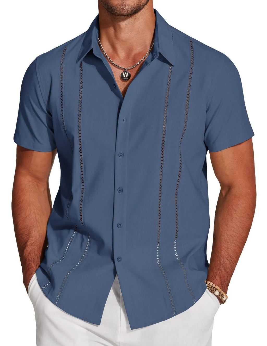 Man wearing a slim fit, short sleeve Hawaiian shirt with a colourful digital print pattern.