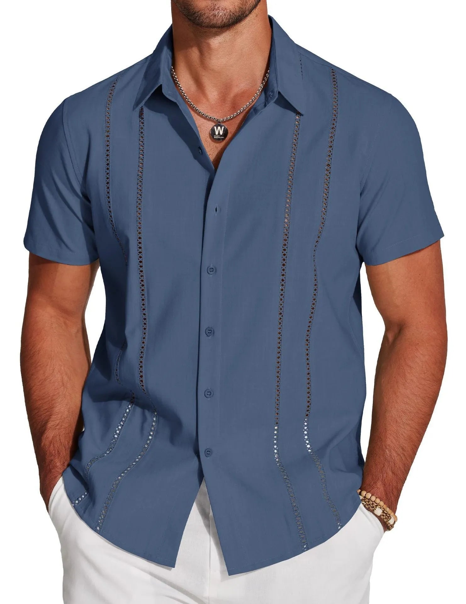 Man wearing a slim fit, short sleeve Hawaiian shirt with a colourful digital print pattern.