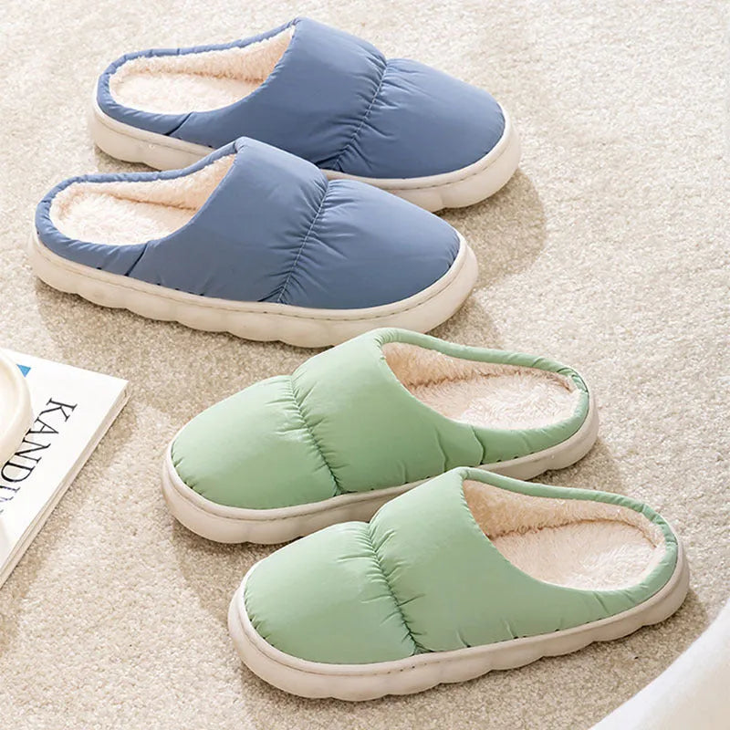 Blue plush indoor slippers with thick rubber sole and artificial fur lining
