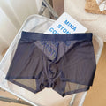 Men's seamless boxer shorts in quick-drying nylon fabric, shown in multiple colours including rock ash and Congo red