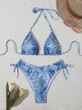 Women's denim blue printed bikini set with adjustable straps, front view