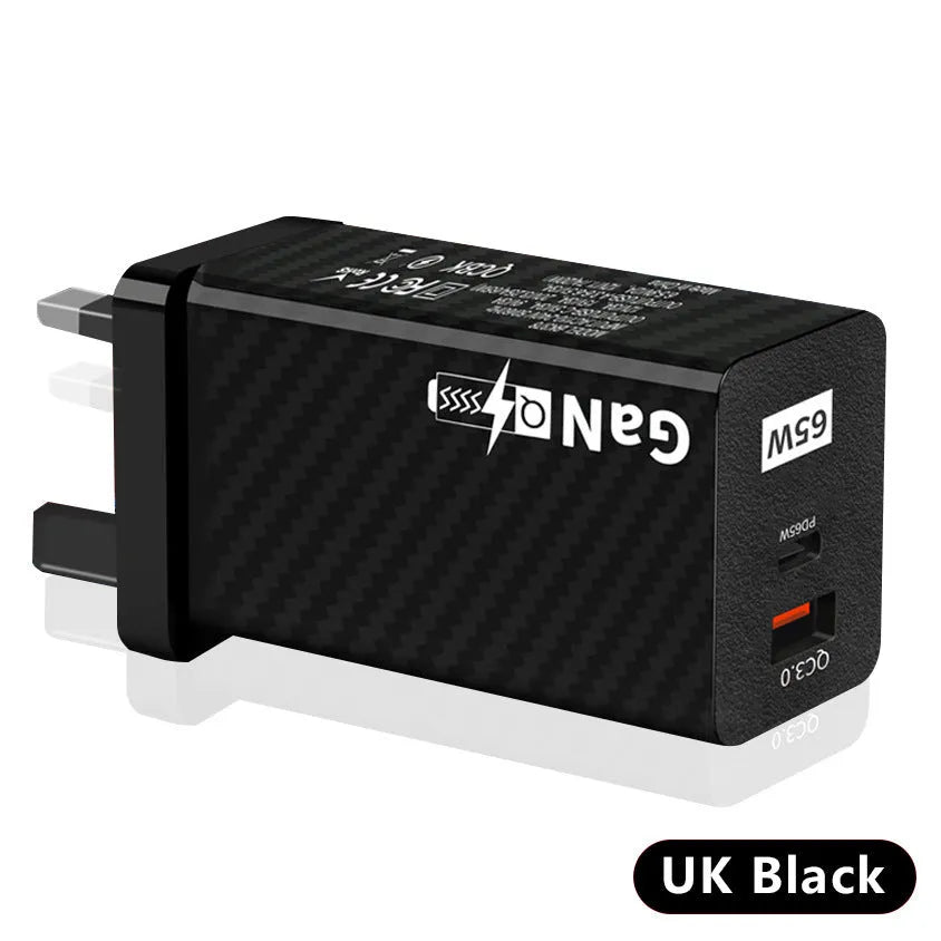 White 65W Gallium Nitride USB-C laptop charger with EU plug next to black version with US plug.