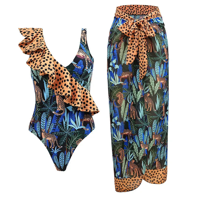 Women's solid colour one-piece swimsuit with spaghetti straps and a removable matching skirt.