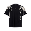 Black short-sleeved T-shirt with rivet ribbon padded shoulders, loose fit, round neck