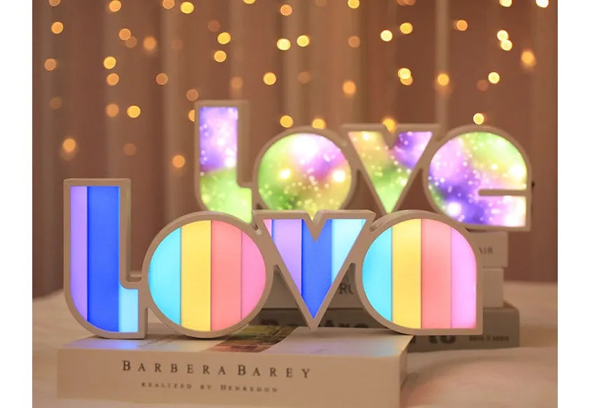 Rainbow style LED LOVE light decoration with plastic shell measuring 35.5cm by 13.5cm