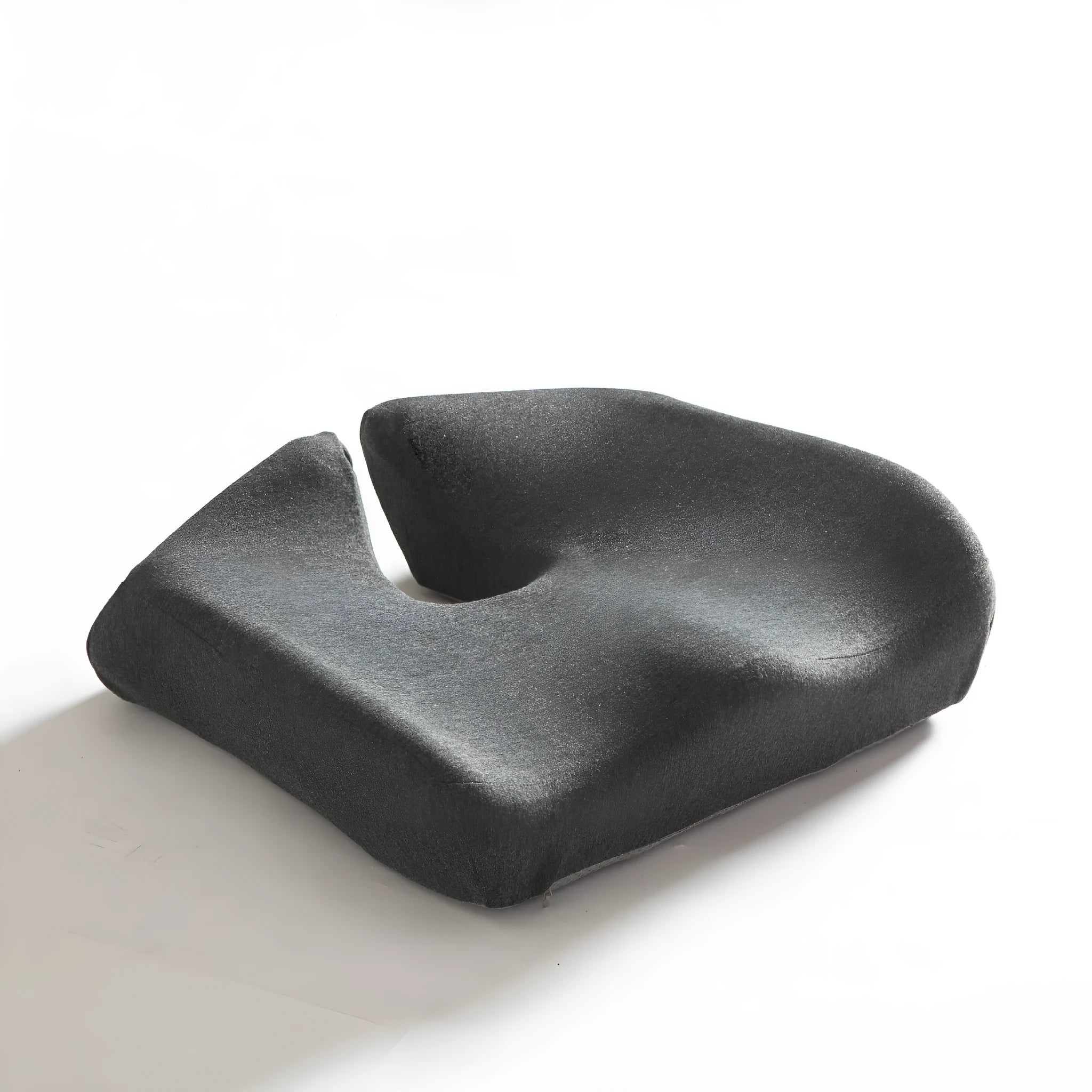 Black memory foam office chair cushion with dimensions 36x40cm on a grey desk chair