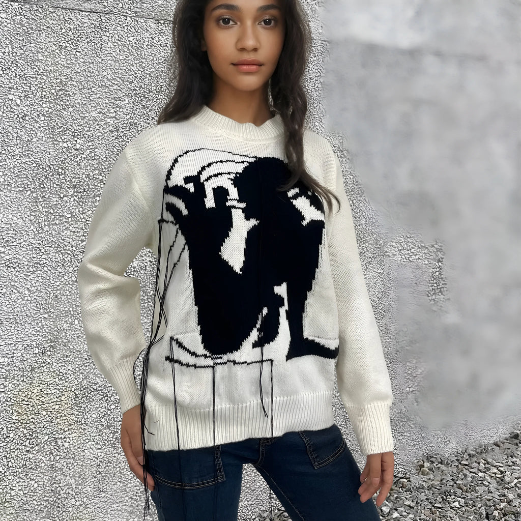 Women's grey alpaca wool sweater with tassel design and abstract pattern