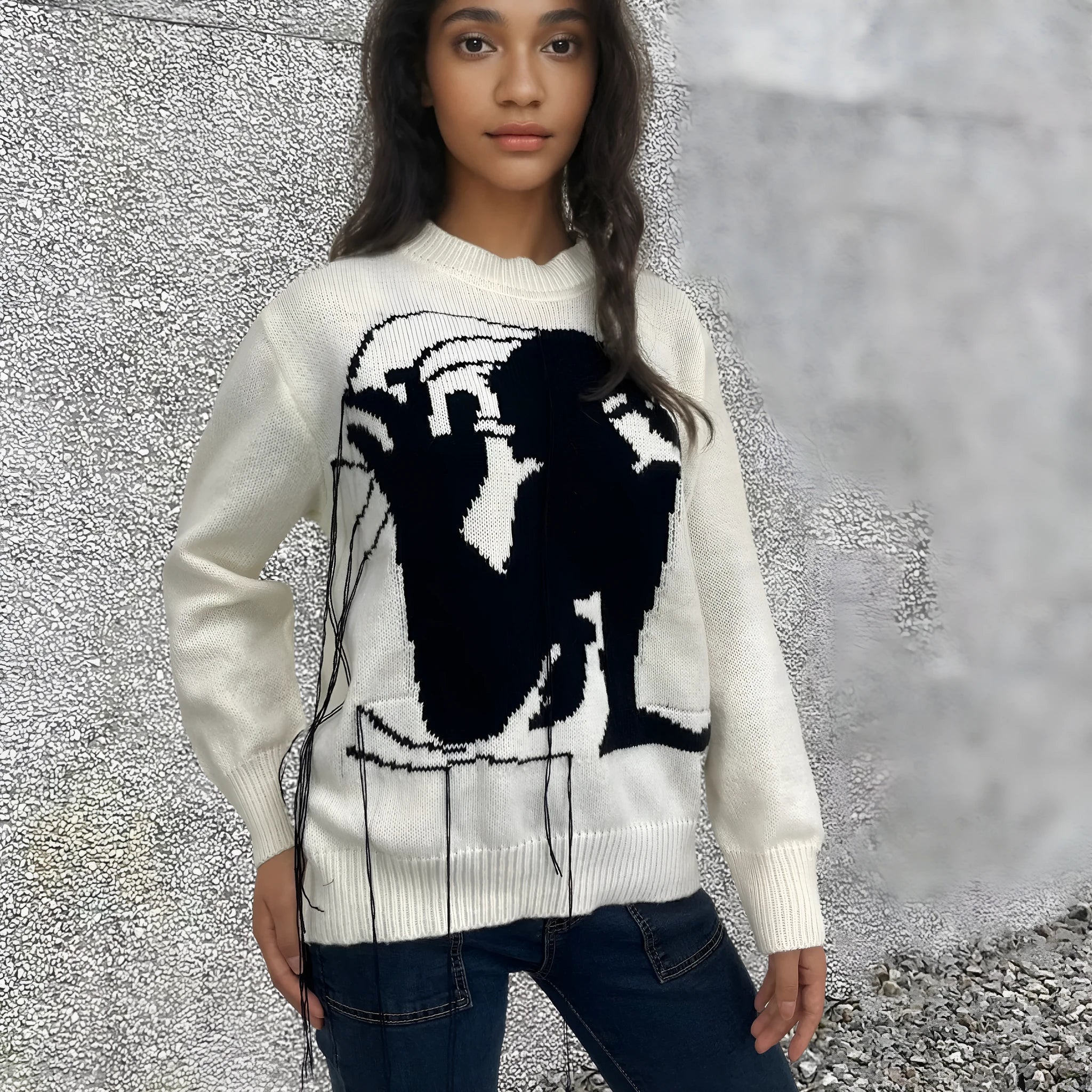 Women's grey alpaca wool sweater with tassel design and abstract pattern