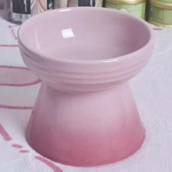 Ceramic pet bowl with anti-tumble design and raised chin support for cats and dogs