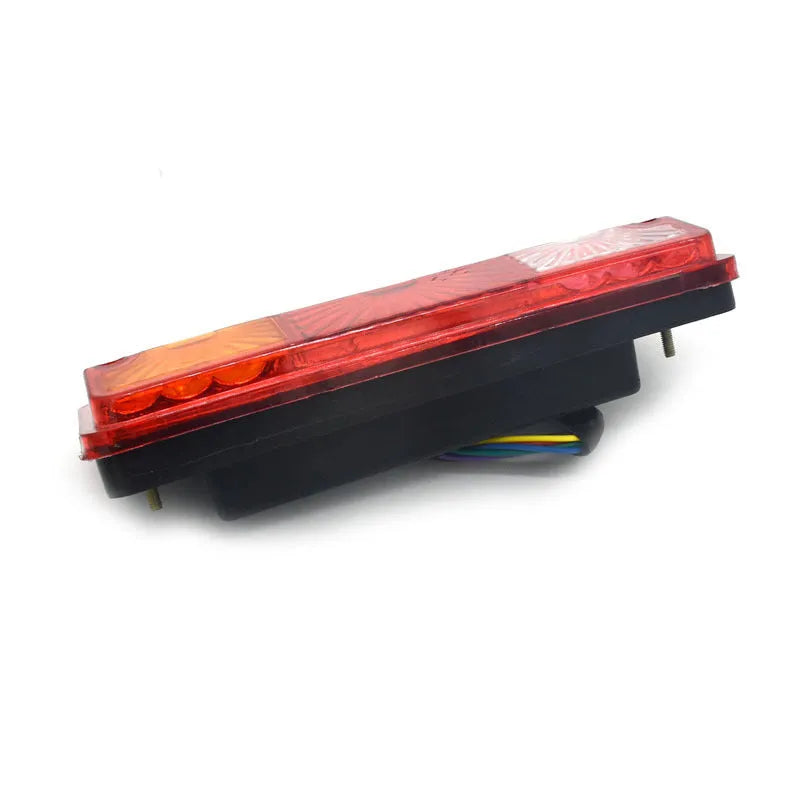 Black integrated shell semi-closed taillight for electric tricycles, 200mm by 70mm in size.