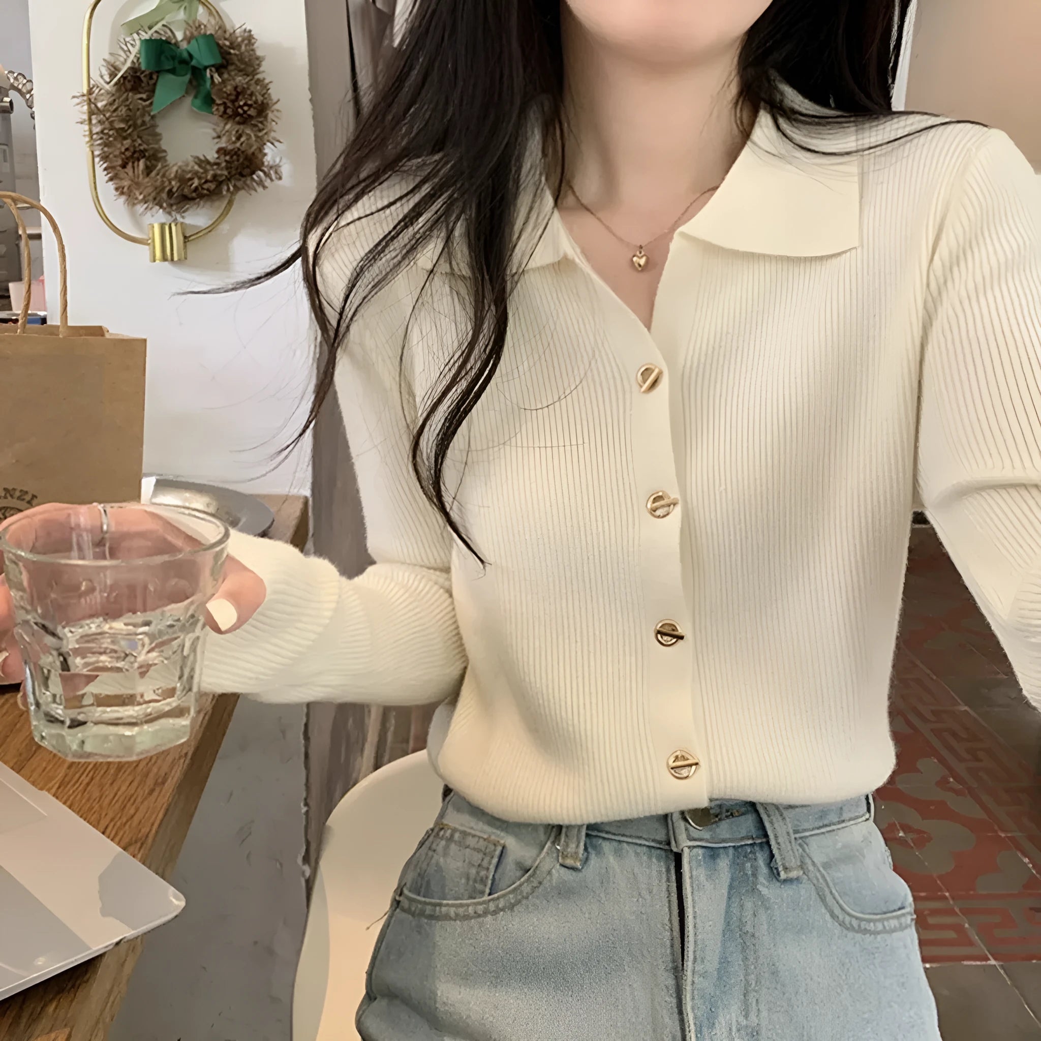 Women's long sleeve loose fit knitted cardigan in viscose fibre, shown in beige colour.