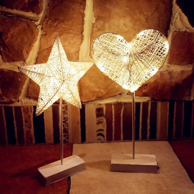 LED string lights with star, heart and moon shapes made from rattan and copper wire for bedroom decoration