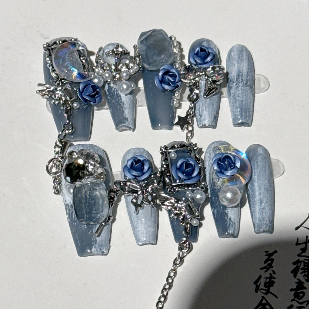 Reusable blue floral press-on nails with rose pattern in sizes XS, S, M, L