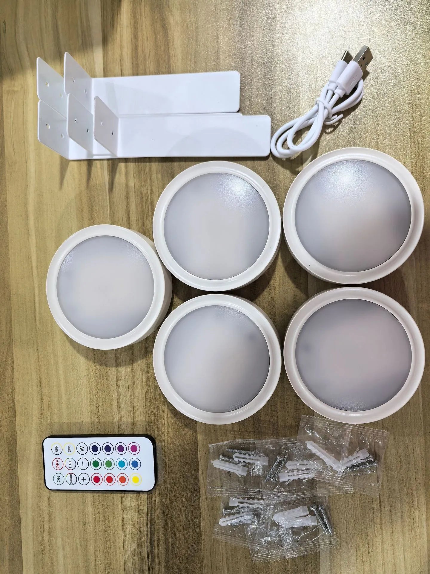 Wireless LED painting lamp with magnetic charging and remote control in black, white or gold finish