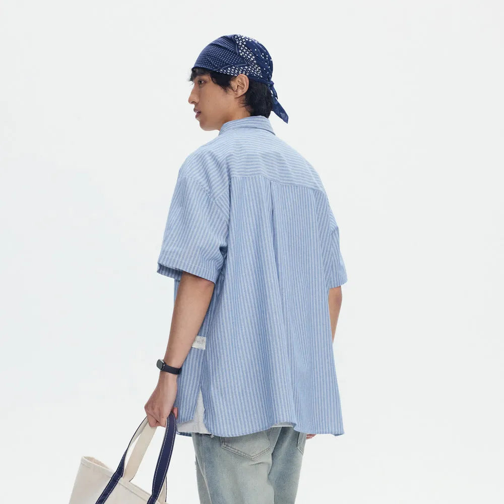 Blue striped short-sleeved overalls shirt with a loose cardigan fit
