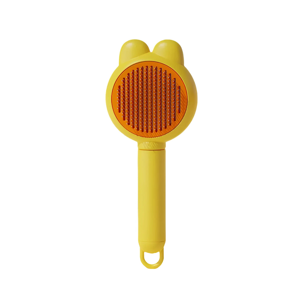 Self-cleaning pet grooming brush in green with stainless steel comb and release button.