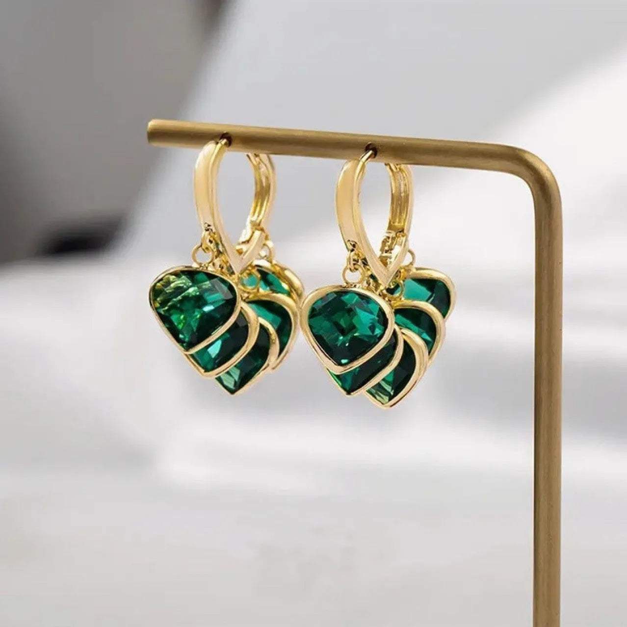 Green heart-shaped glass pendant ear clips with Korean style design and alloy gemstone details