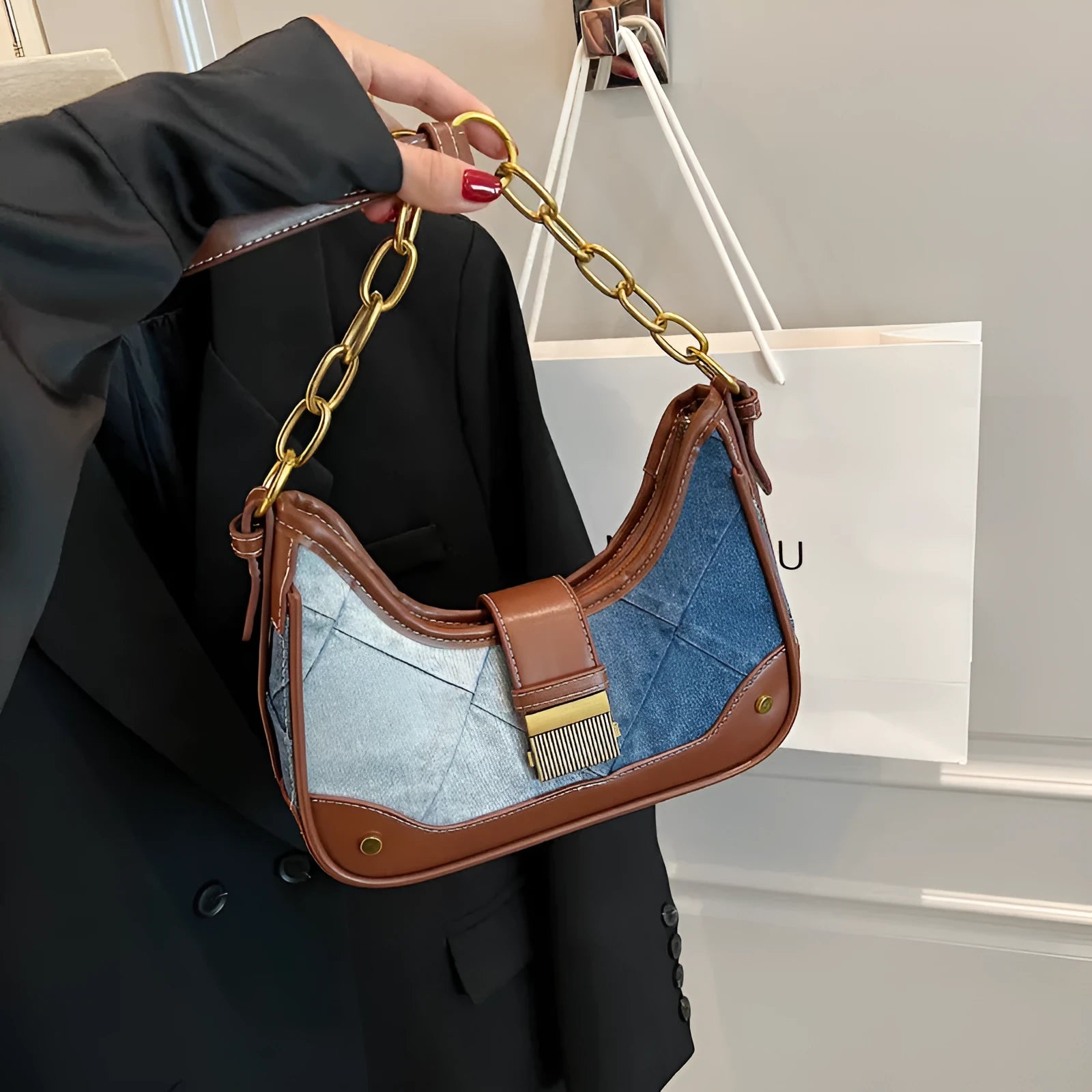 Brown soft denim women's bucket shoulder bag with diamond mesh panels and chain strap