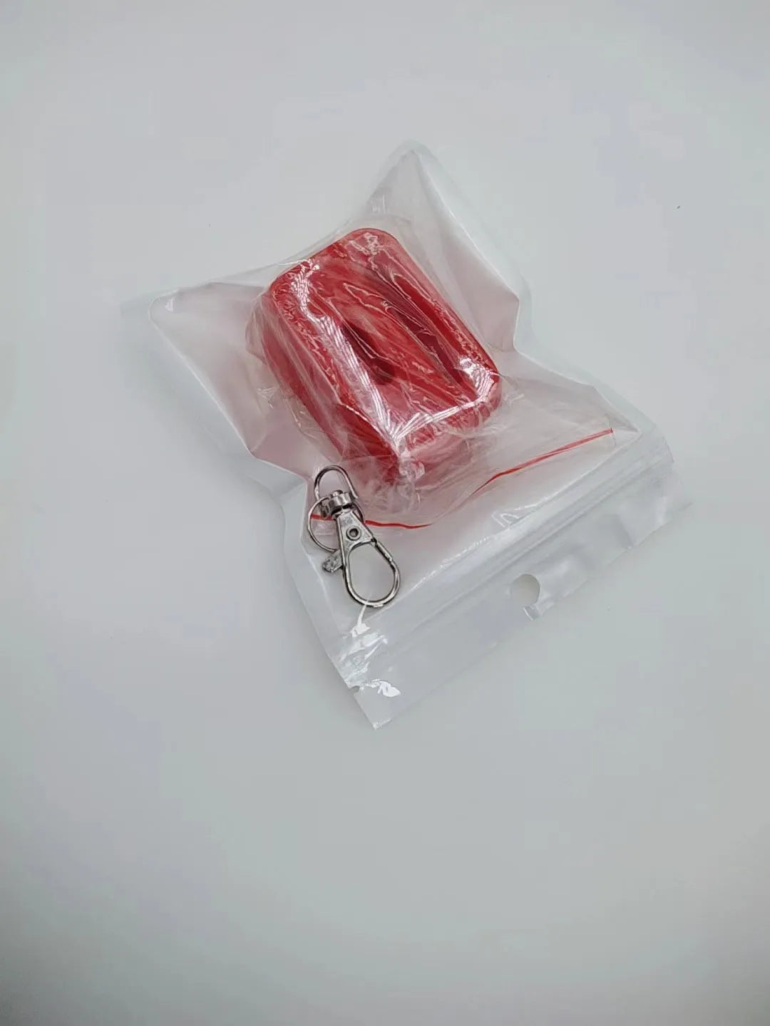 Black and red plastic seat belt buckle clamp holders for automotive use