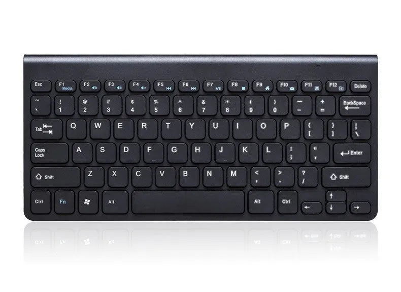 Black wireless keyboard and mouse set with 4G receiver on wooden desk