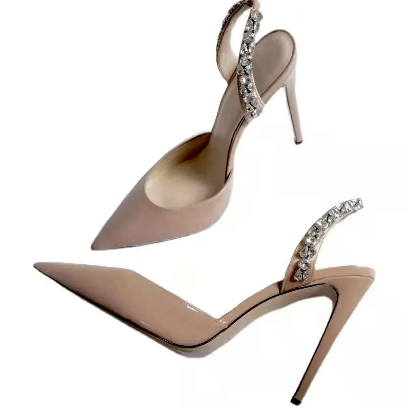 Women's black patent leather pointed toe high heel sandals with rhinestone details on the sides