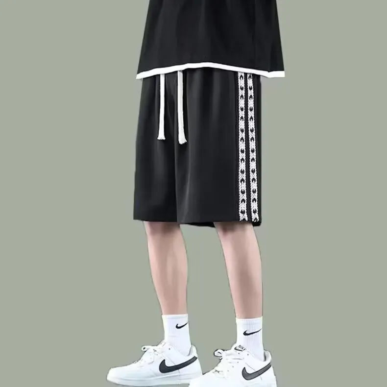 Men's casual baggy track pants in micro-elastic polyester available in sizes M to 5XL