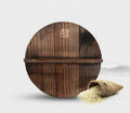 Black traditional iron wok pan with wooden handle and induction base
