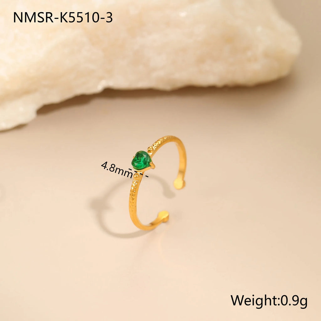 Open-ended stainless steel ring featuring a geometric heart shape with an inlaid zircon stone.