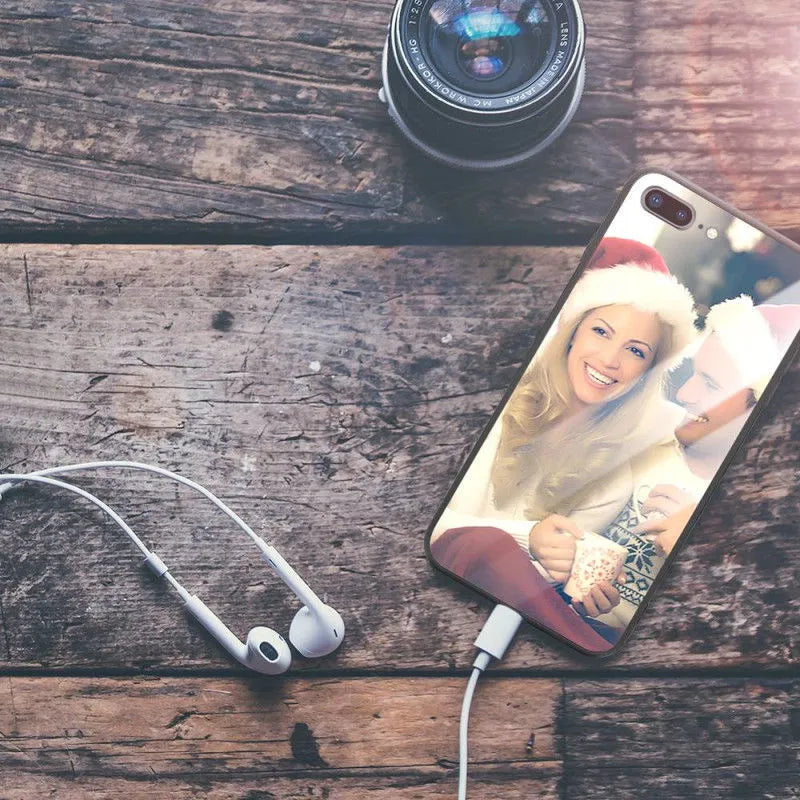 Slim protective case for iPhone with raised bumper edge around screen and camera.