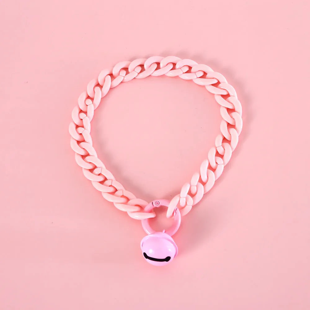 Macaron candy coloured plastic pet collar for cats, dogs, and rabbits in chain blue, pink, and mixed colours on a white background.