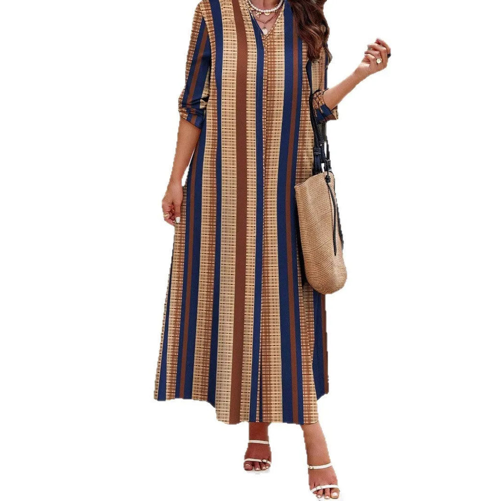 Camel coloured vertical striped V-neck long dress with A-line skirt and long sleeves.