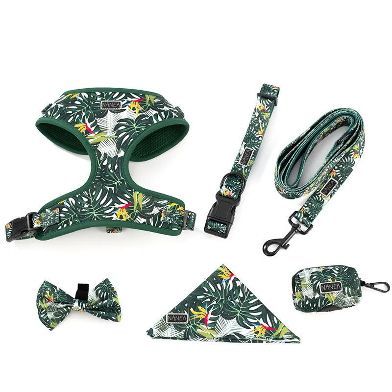 Six-piece adjustable cloth dog harness set with leash, collar, waste bag, bow tie, and scarf in assorted colours.