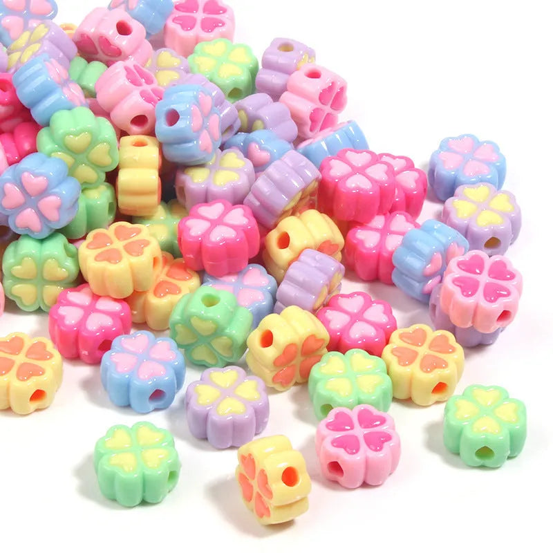 15mm frosted acrylic four-leaf clover love beads in mixed colours including rose red, pink, yellow, green, blue, purple.