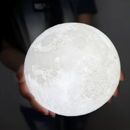 3D printed white moon lamp on wooden stand with touch metal ring at base