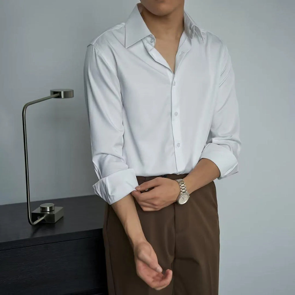 Man wearing a black loose-fit long sleeve cardigan shirt in Korean style.