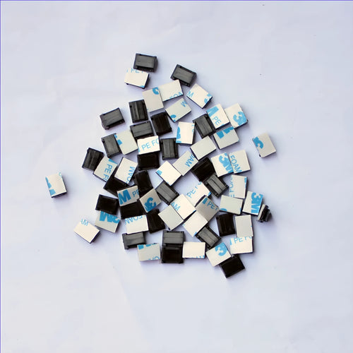 Black PA66 nylon cable management clip for automotive and electronic wiring.