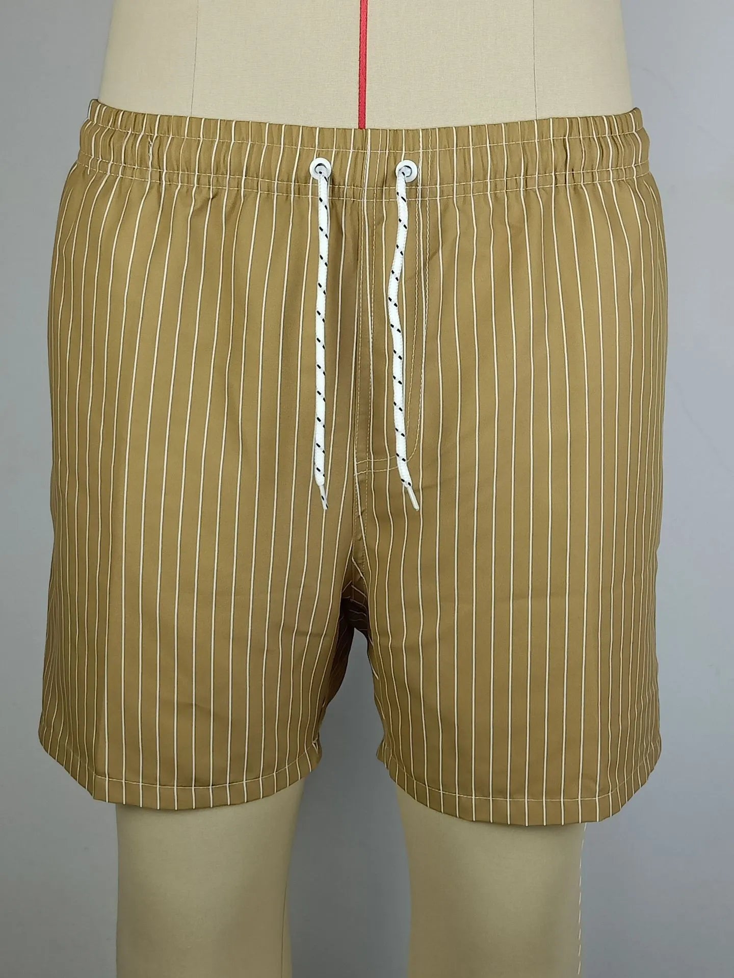 Striped casual shorts in light blue, shown front-on, with straight leg opening.