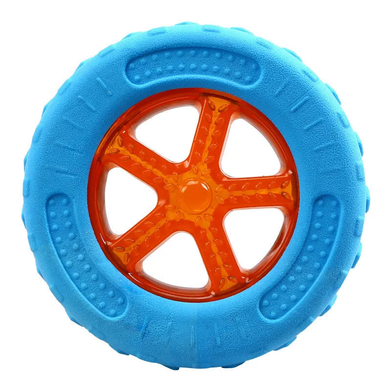 Set of three TPR dog toys: a squeaky ball, barbell and floating tires for water fetch.