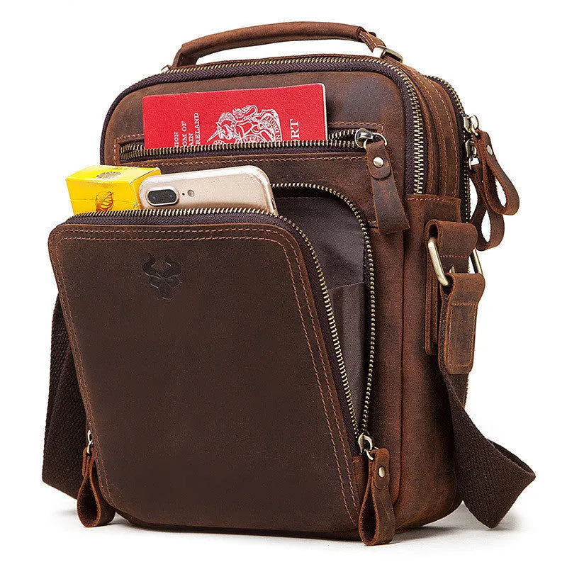 Men's brown leather crossbody bag with single-shoulder design showing sewing line details and business travel style