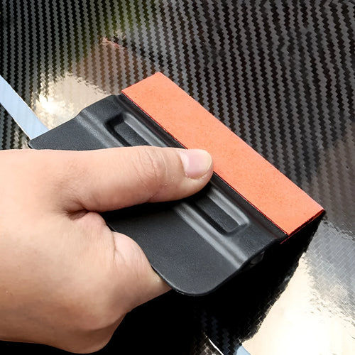 Car vinyl wrap scraper tool with a blue faux deerskin head and black ABS plastic handle.