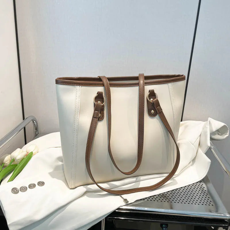 PU leather tote bag with contrast colour trim and internal mobile phone and document compartments