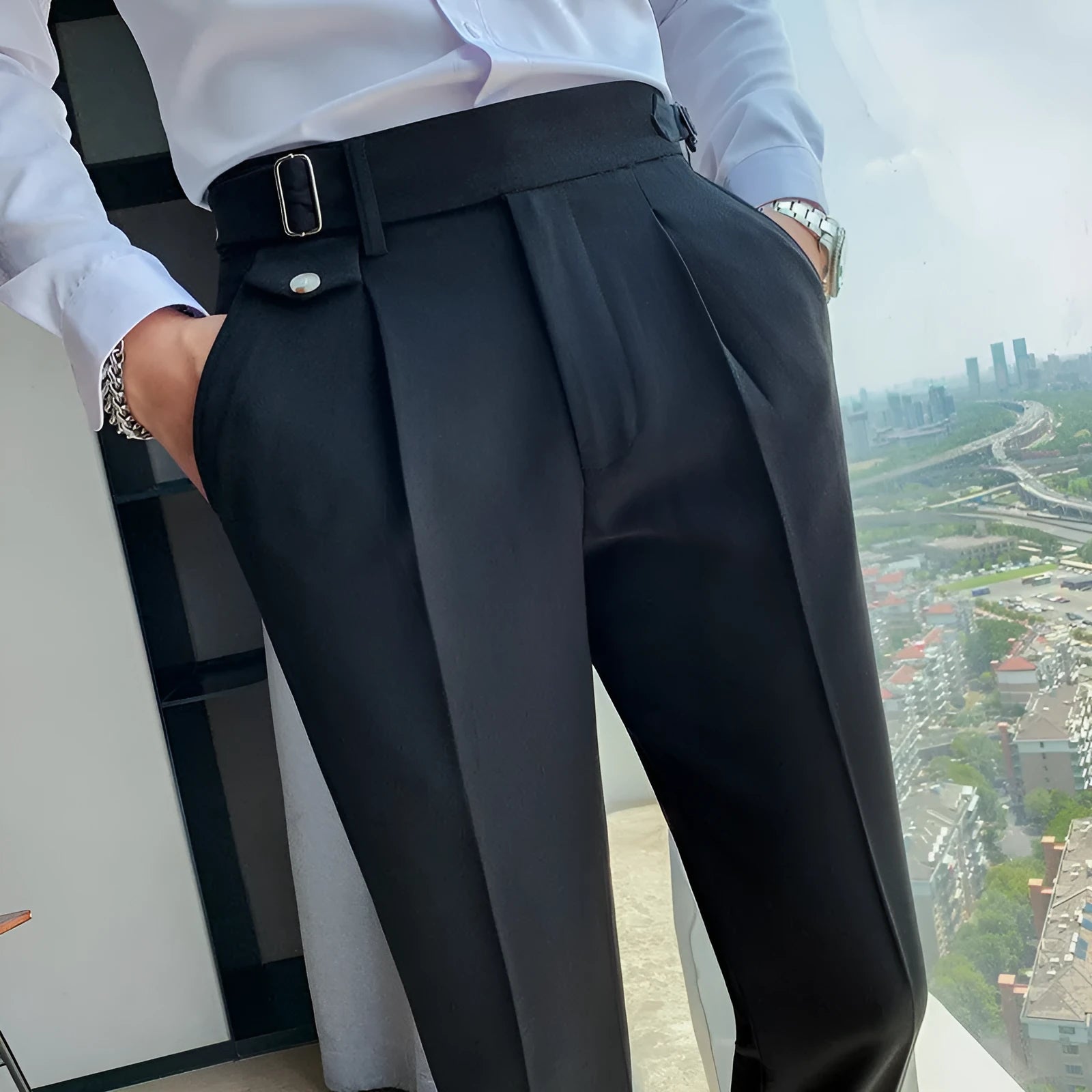 Straight-leg casual trousers in solid colours including black, grey, and khaki on a neutral background.