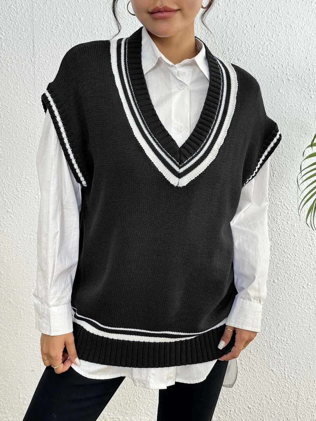 Women's loose fit college style vest sweater in acrylic polyester blend, black blue coffee colour options
