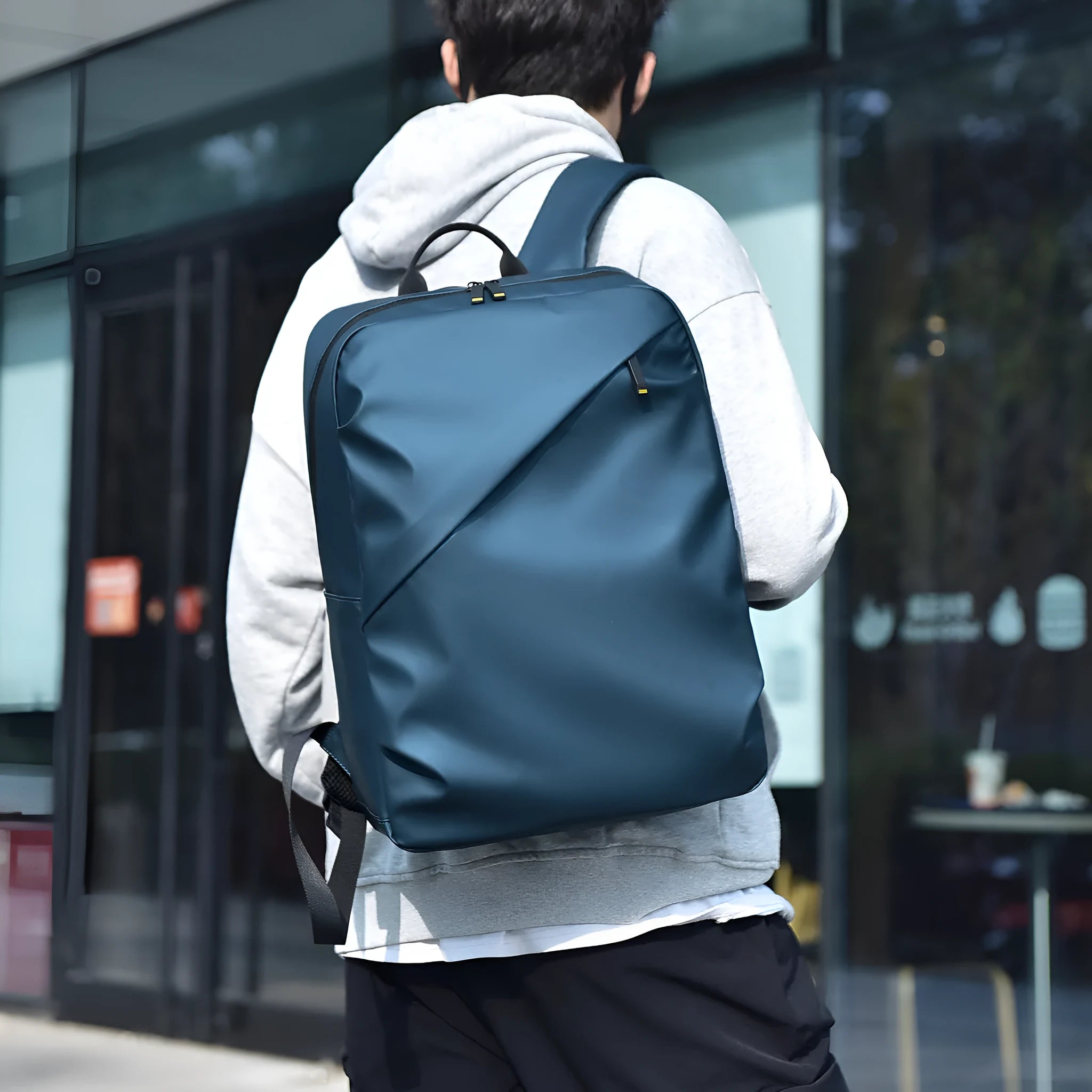 Men's waterproof backpack in black colour made from PU leather with large capacity design